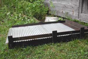 bottom edge of solar food dryer