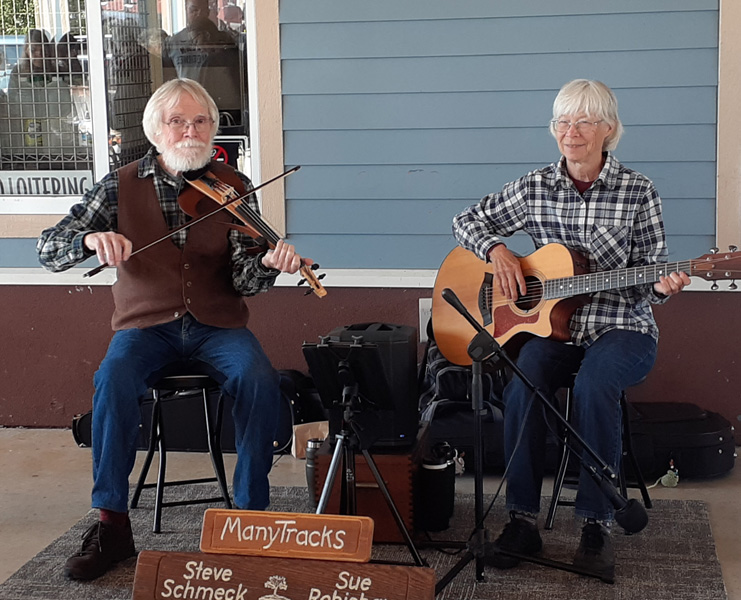playing music at the Escanaba Farmers Market 2023