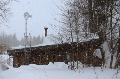 snowstorm cabin roof