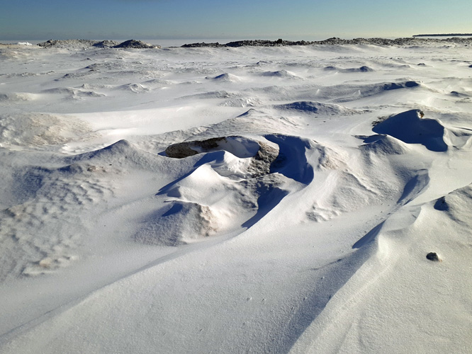 snow drifts along Thompson beach shoreline